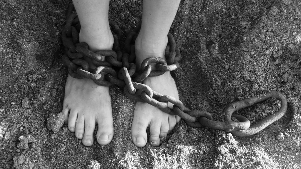 victim of human trafficking in chains